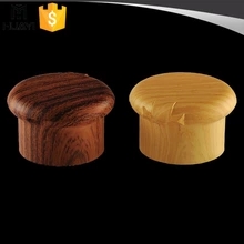 Wood grain cosmetic plastic flip top cap for lotion bottles, 