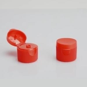 Red ribbed skirt hinged flip top plastic snap cap dispensing cap